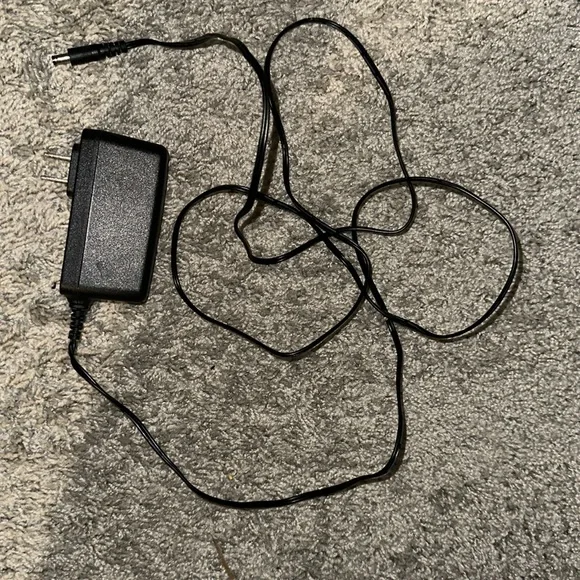 Arris Wi-Fi router with a charger